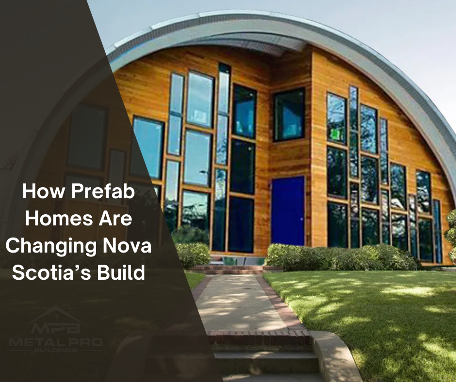 Modern prefab home with arched metal roof and large geometric windows in Nova Scotia.