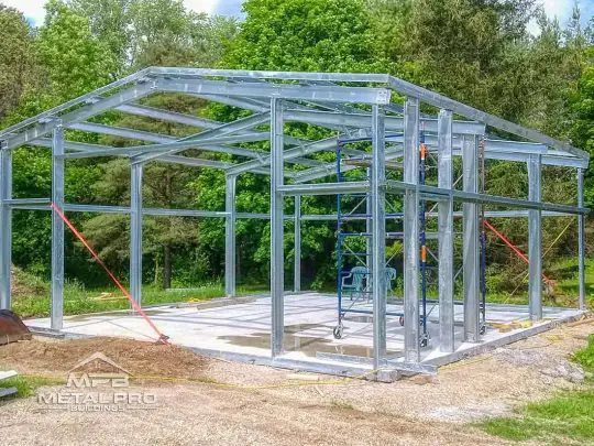 prefab building foundation with a building being erected