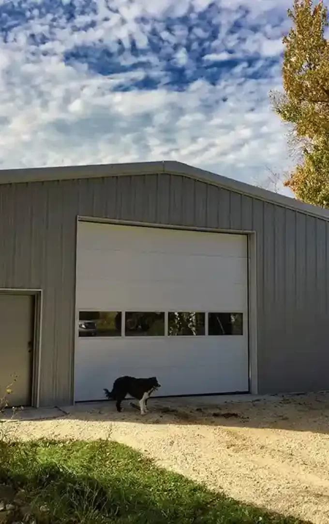 cold formed steel storage building with garage and entry door