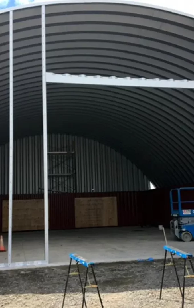 erecting a shipping container cover