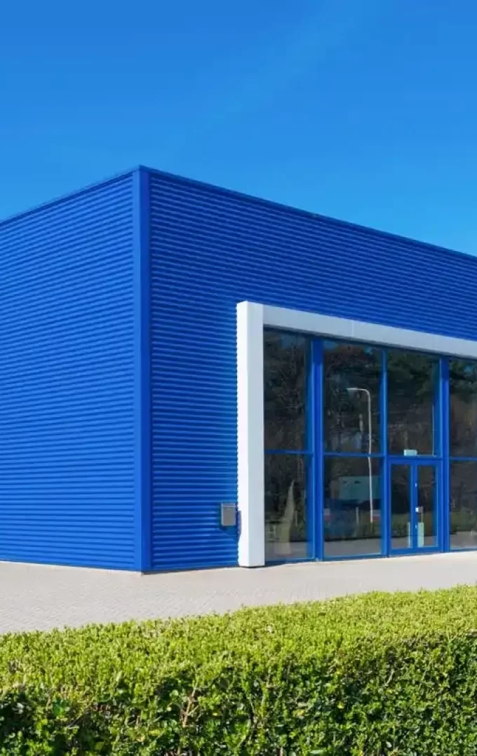 steel office building with blue coloured wall liners