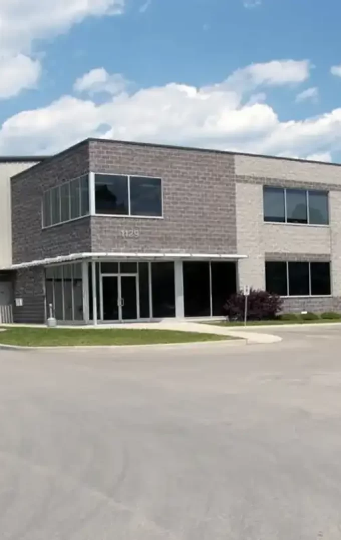steel office building with cream coloured wall liners