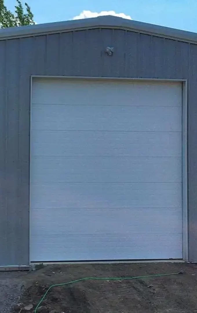 interior of a straight wall storage building painted grey